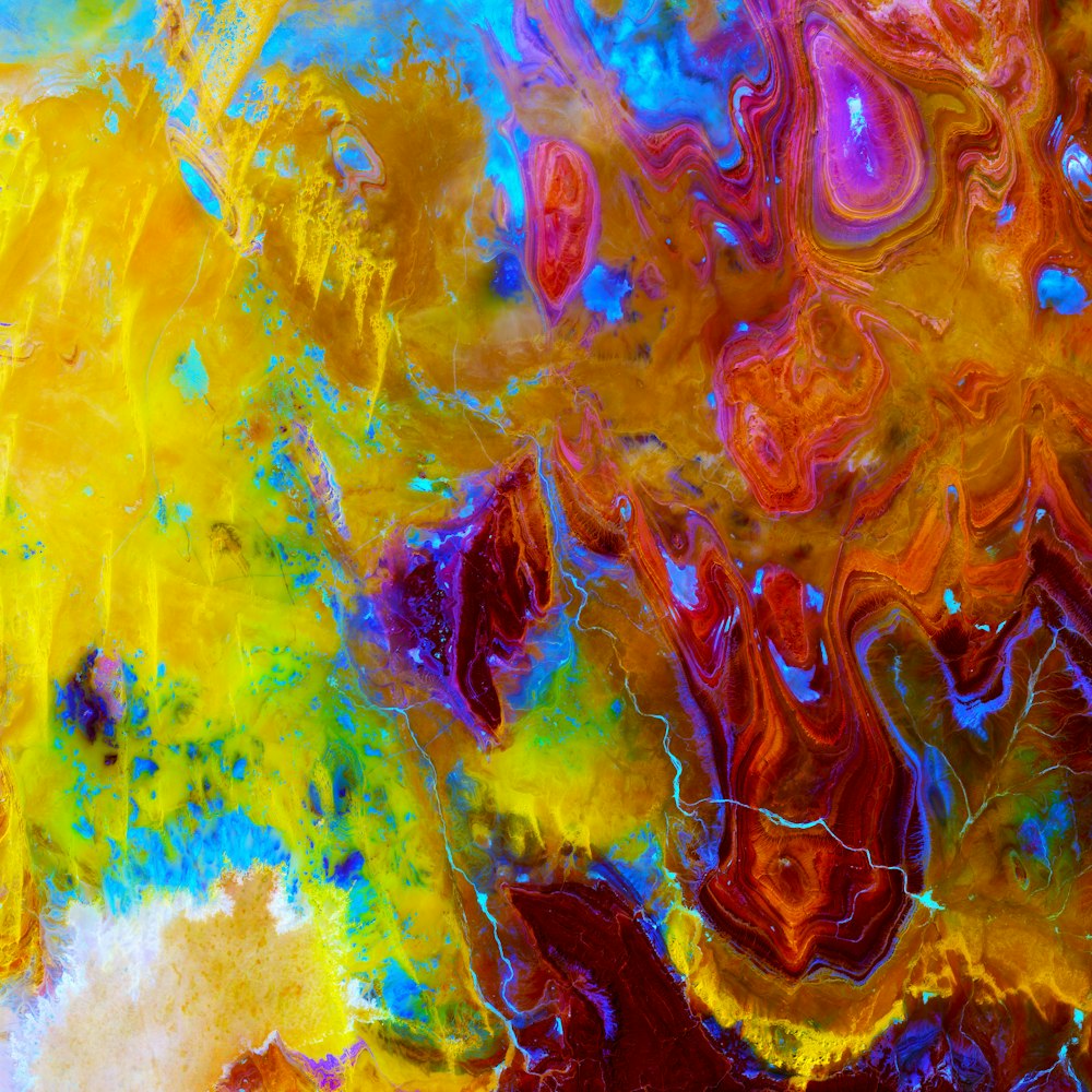 Una pintura abstracta con muchos colores y formas