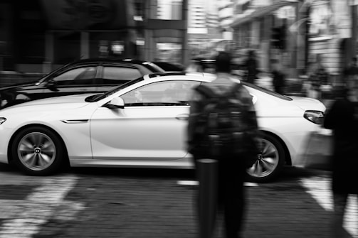 A dynamic shot of the vehicle navigating through bustling city traffic.