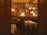 A cozy restaurant interior with elegant decor and warm lighting.