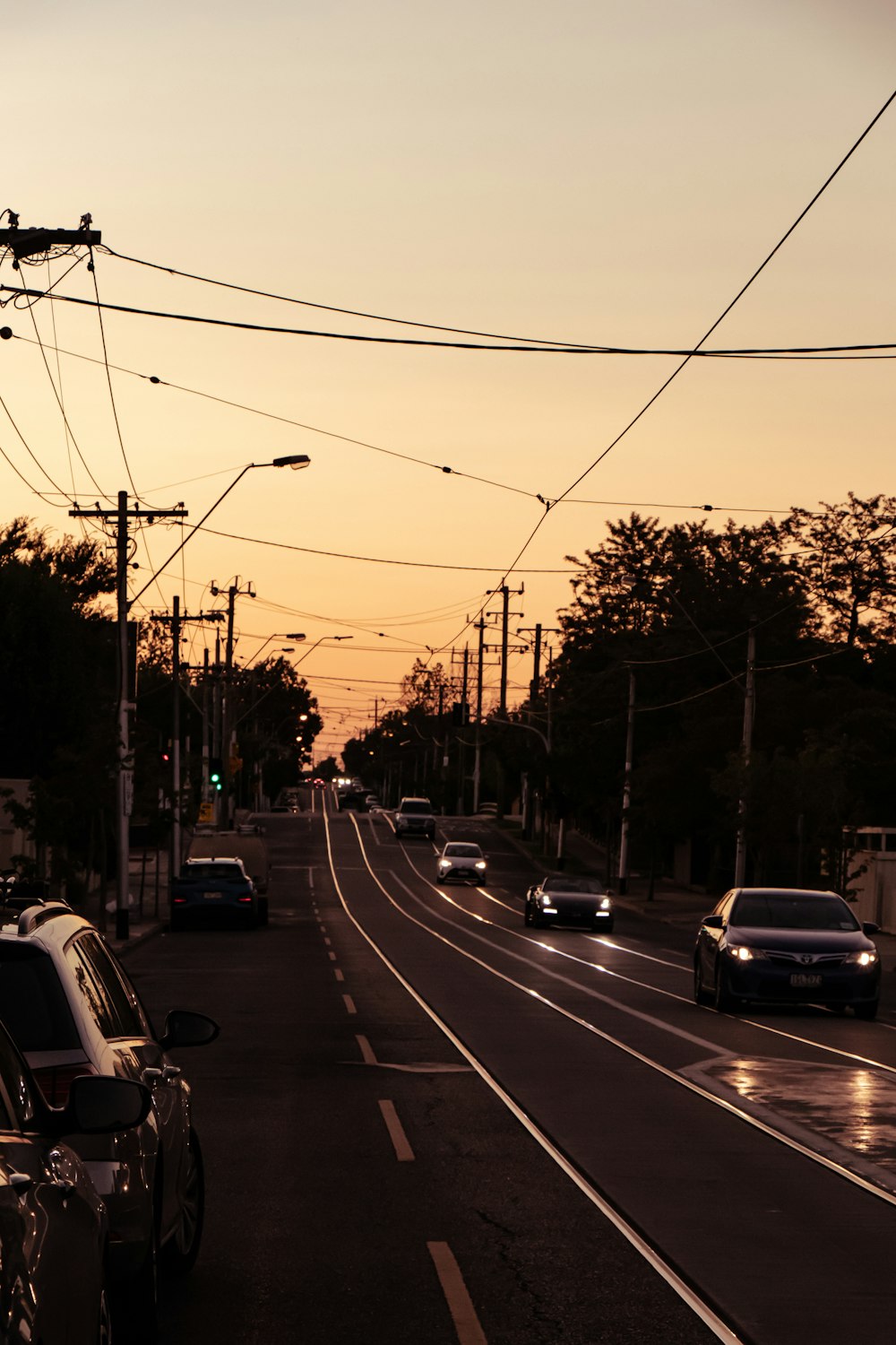 cars on road during sunset