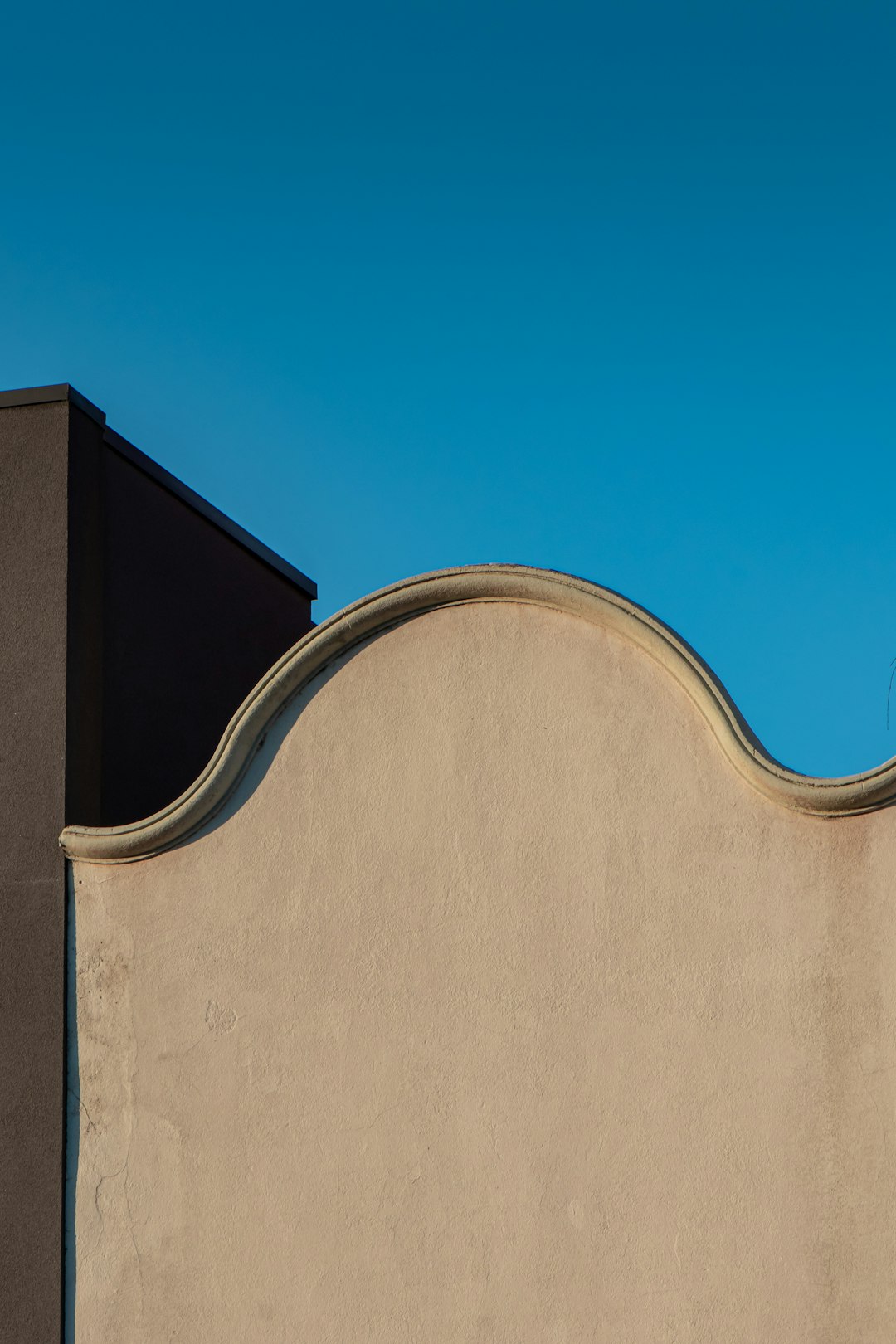 brown concrete building under blue sky during daytime