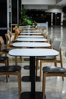 white and brown wooden table with chairs