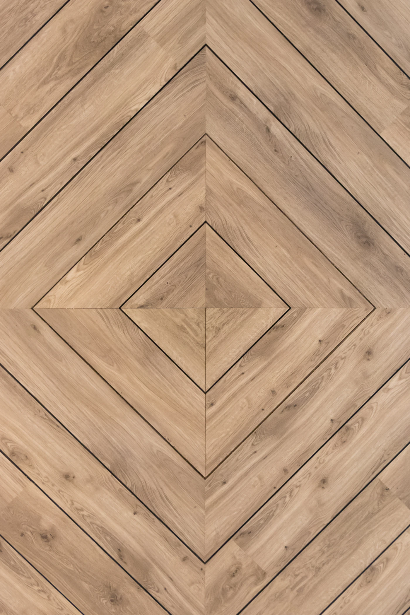 Detail eines hochwertigen Holzbodens — geprüfte Materialqualität als Grundlage jeder Lieferantenwahl.