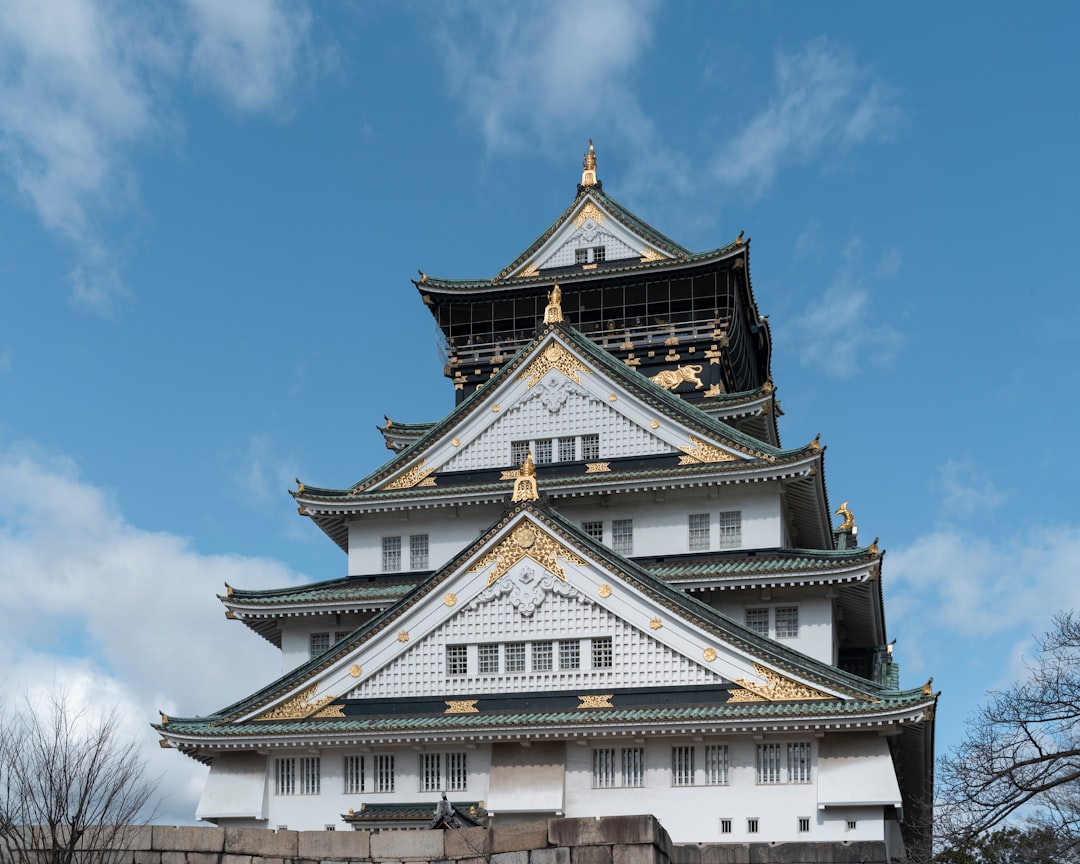 white and gold temple under blue sky during daytime