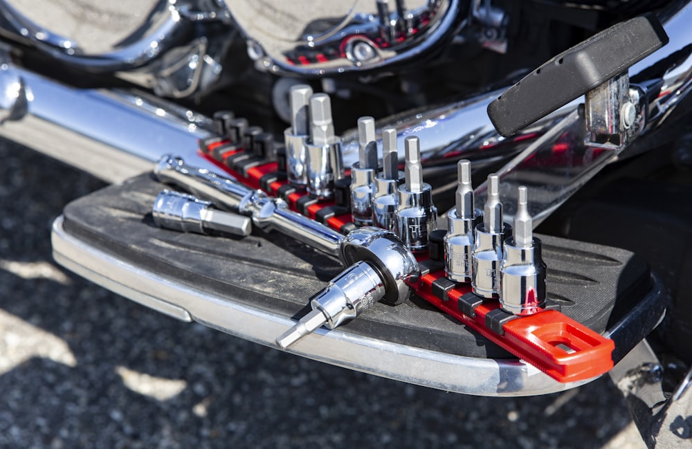 silver and red motorcycle engine