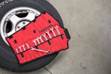 black and red car wheel