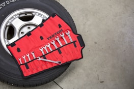black and red car wheel