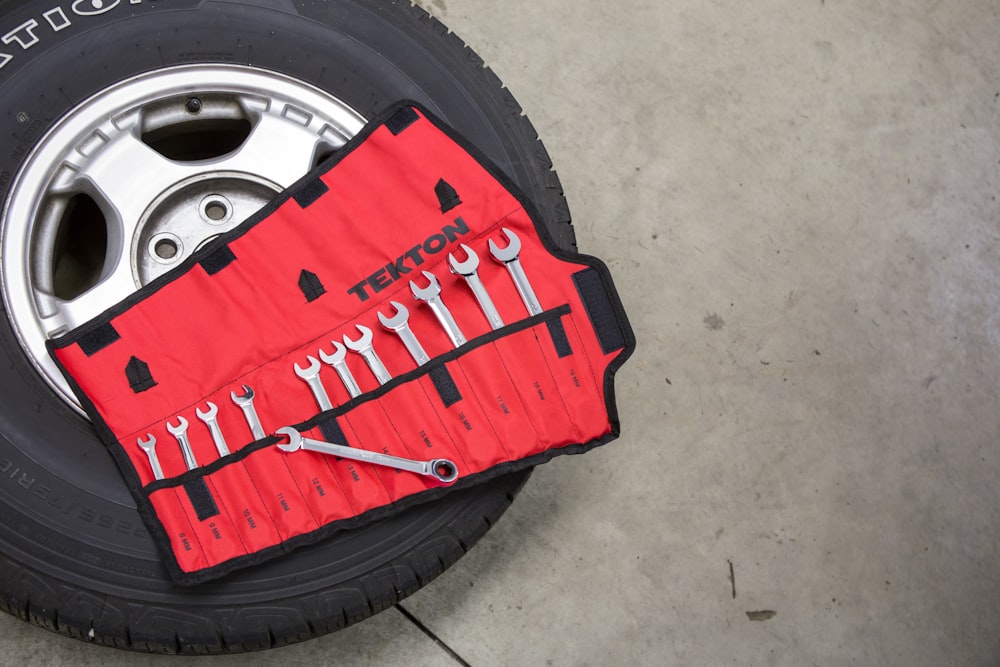 black and red car wheel