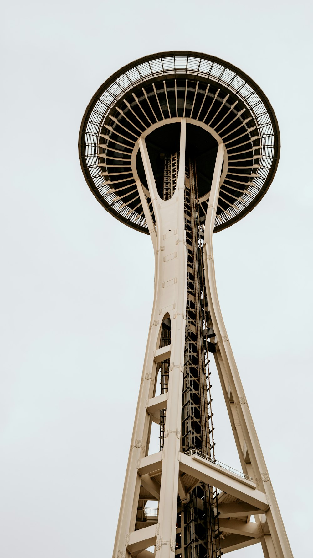 white concrete tower under white sky