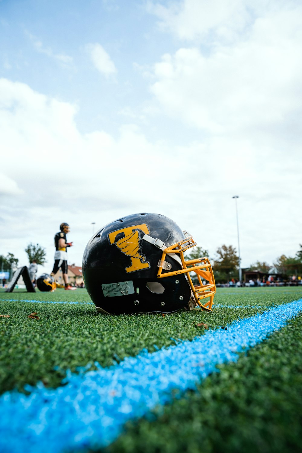 football players on green field during daytime