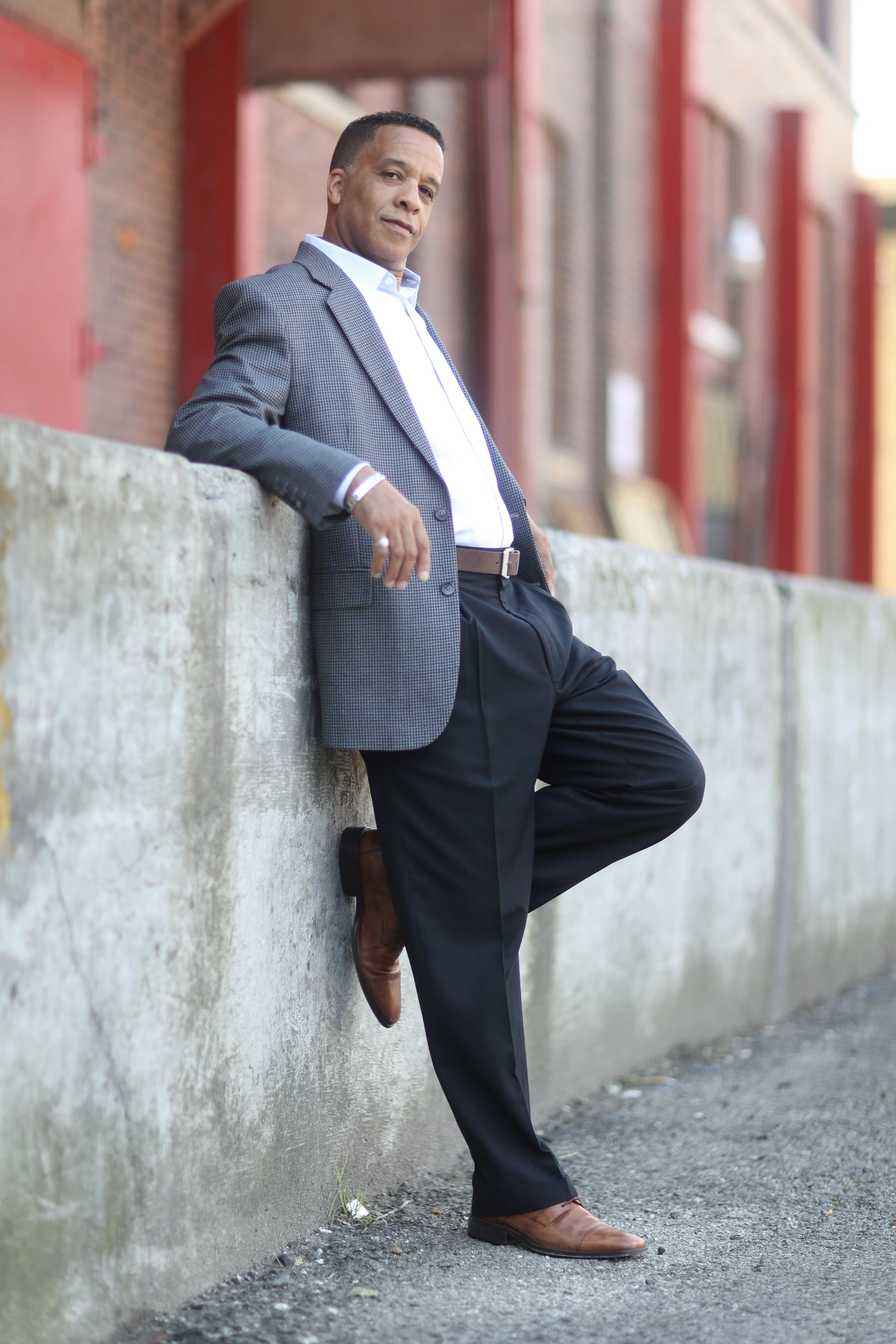 black dress shirt with gray pants A man in a and grey 71100465 Stock Photo at Vecteezy Charcoal grey dress pants cover all the bases with a smooth color thats appropriate for every event and style thats adaptable to every situation Medium Grey Performance Slim Fit