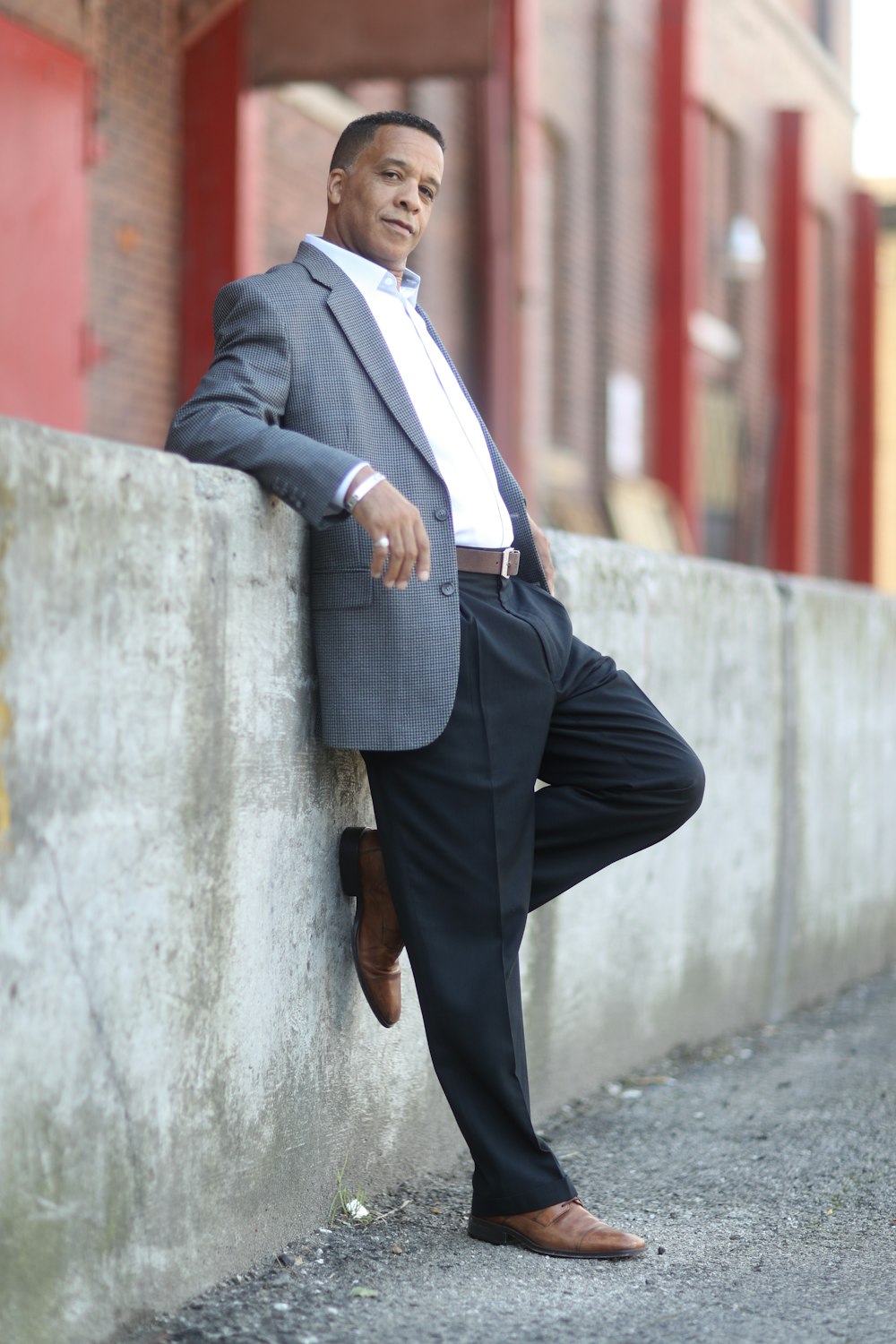 man in black suit jacket and black dress pants