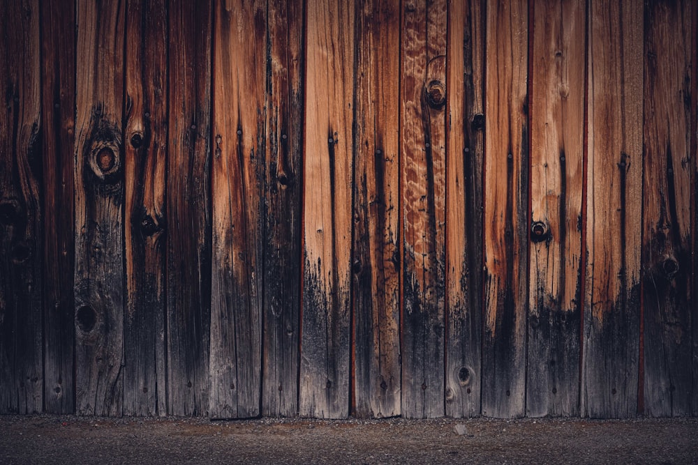 brown wooden wall with hole