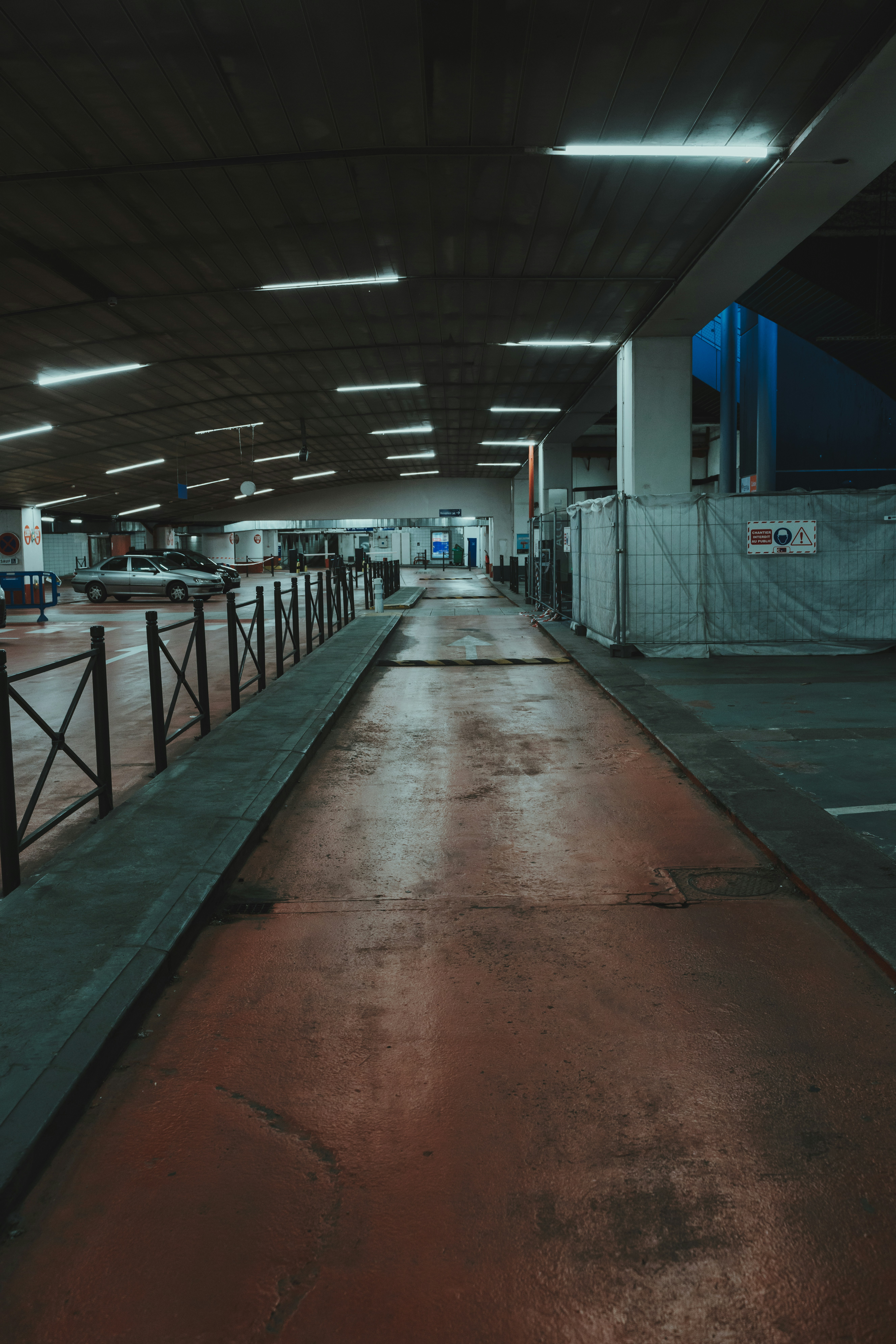 empty hallway with white metal posts