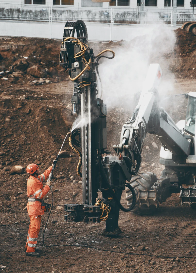 Field operator drilling on a resource site