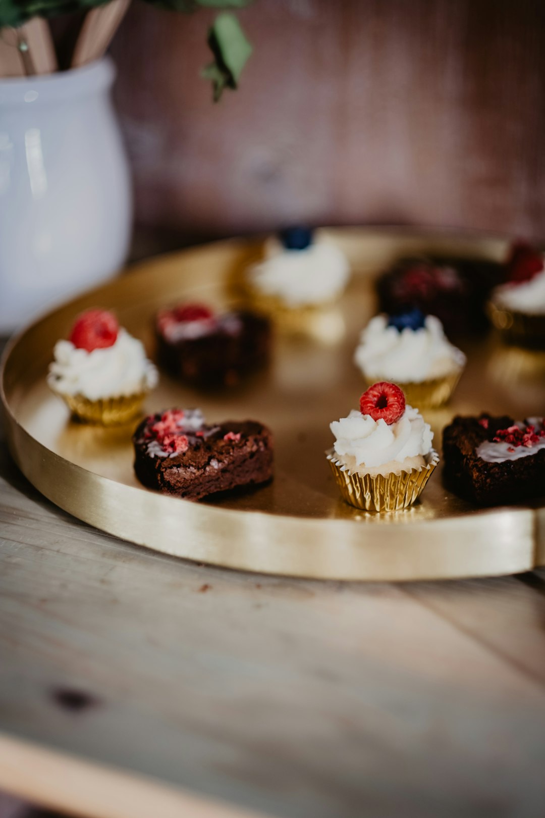 chocolate cake on brown wooden tray