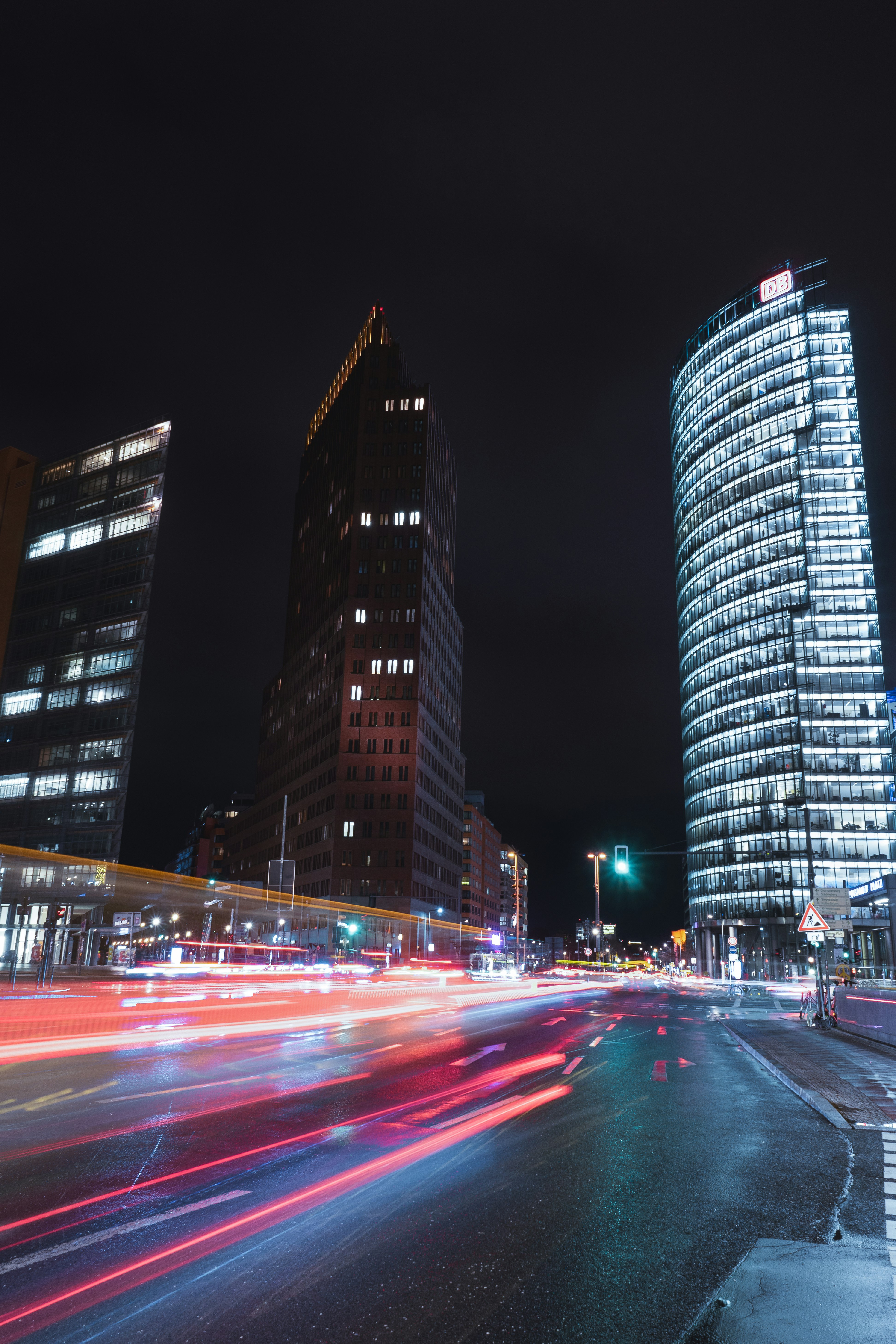 time lapse photography of city buildings during night time