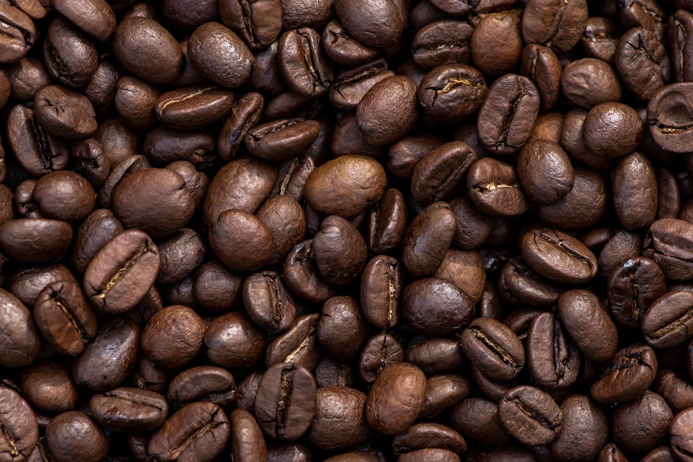 brown coffee beans on brown wooden table