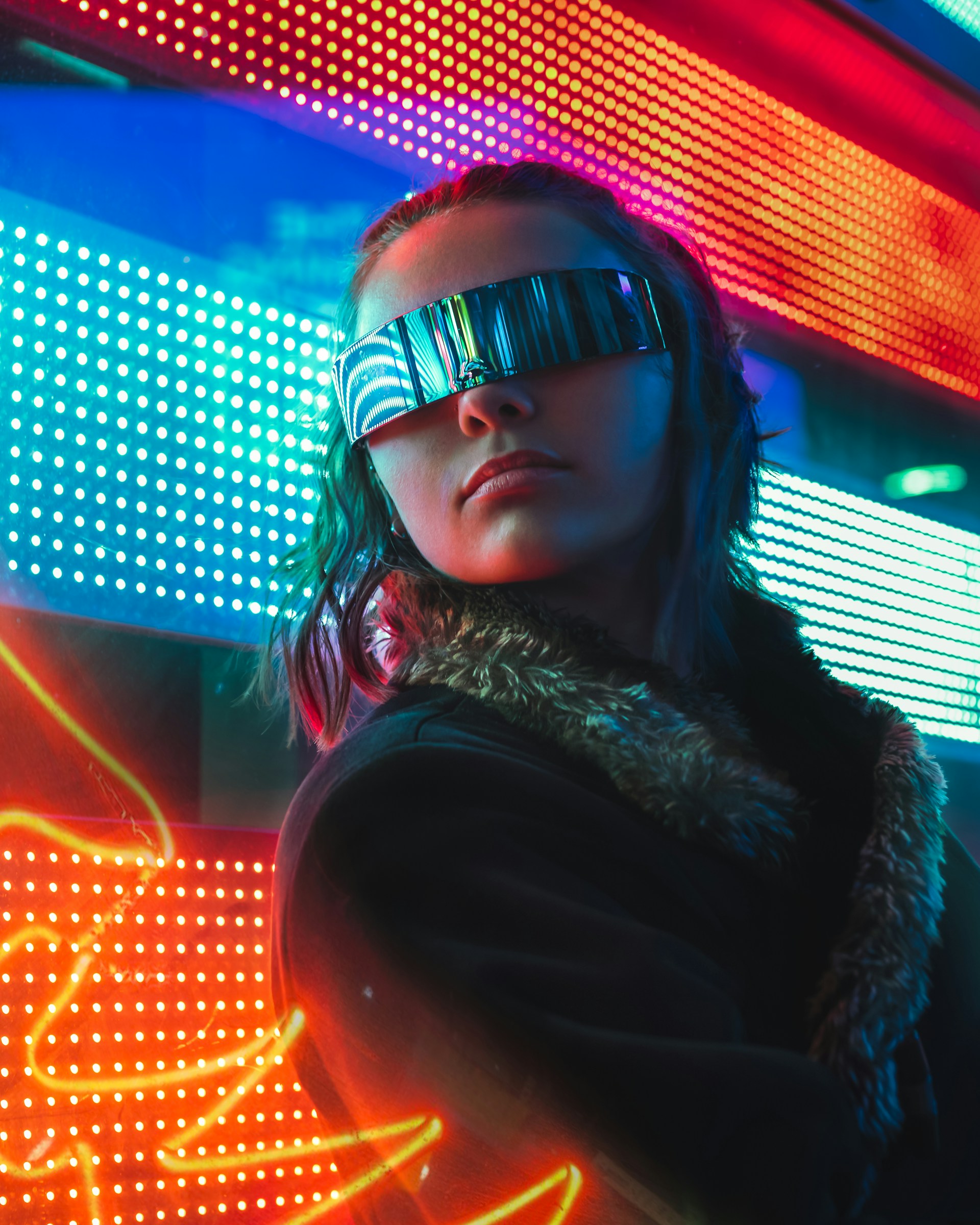 A shadowy figure wearing futuristic goggles and leather gear, standing in a gritty industrial club filled with pulsating lights and heavy bass vibrations.
