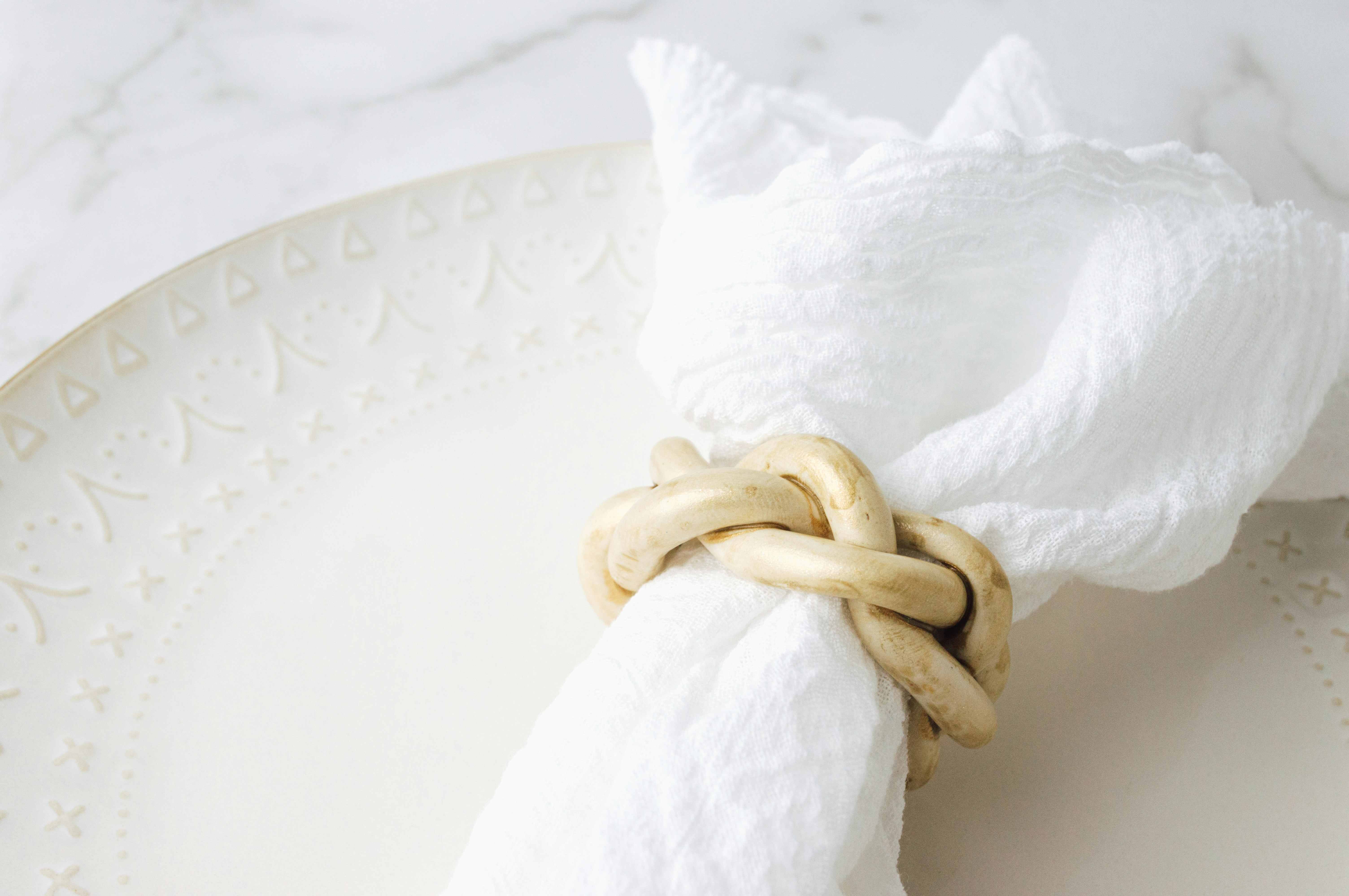 white textile with brown rope