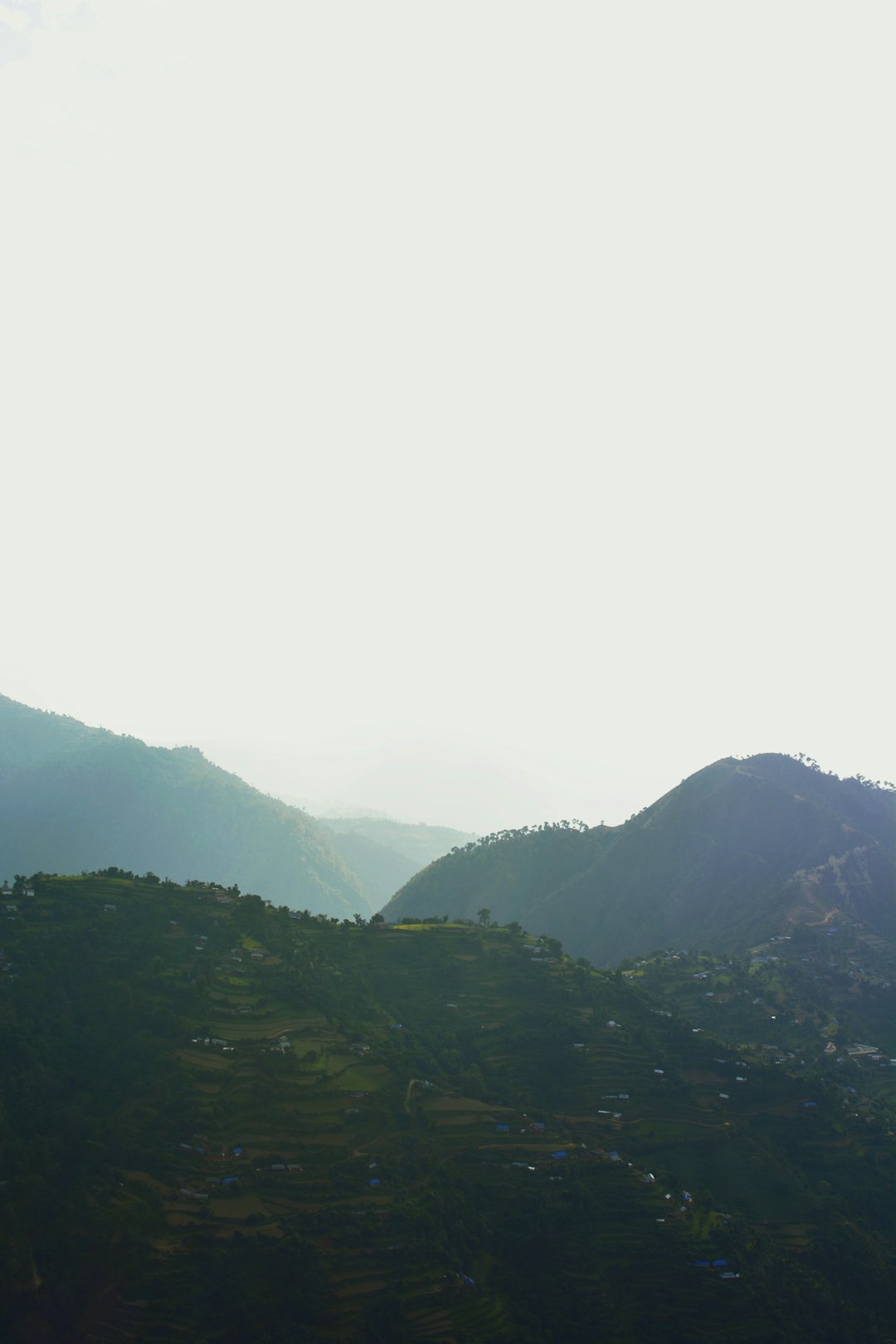 green mountains under white sky during daytime