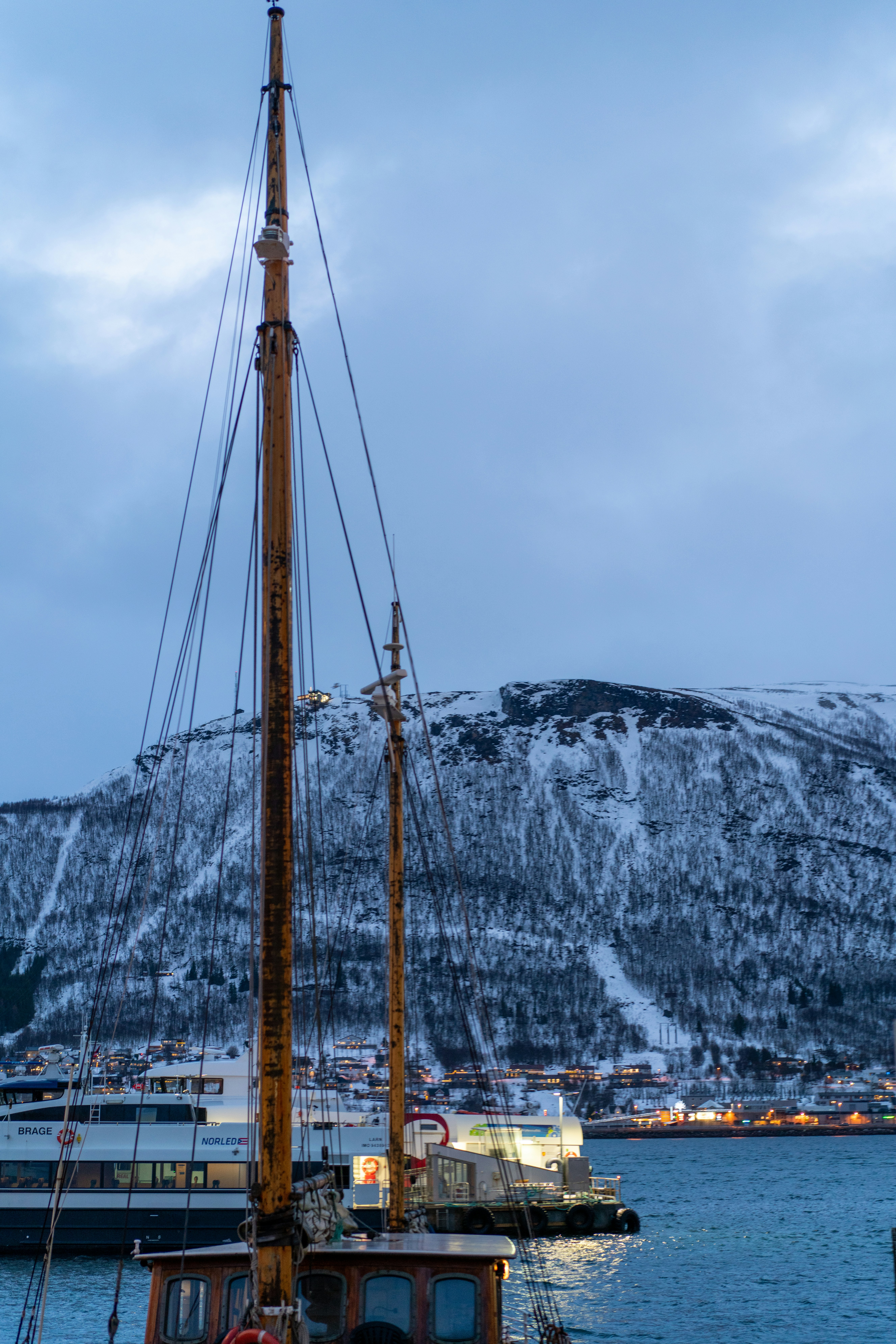 Wooden Post by Snowy Mountain Peak