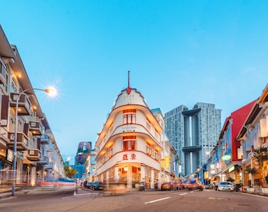 A vibrant city street showcasing diverse urban culture and modern architecture.