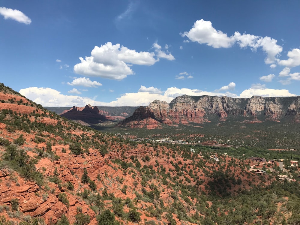 brown rocky mountain under blue sky during daytime