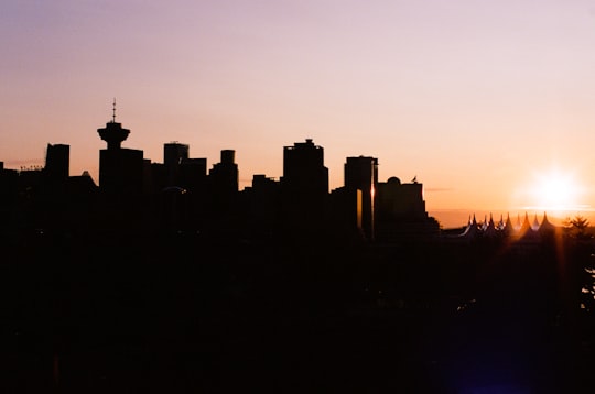 silhouette of city buildings during sunset in Railtown Canada