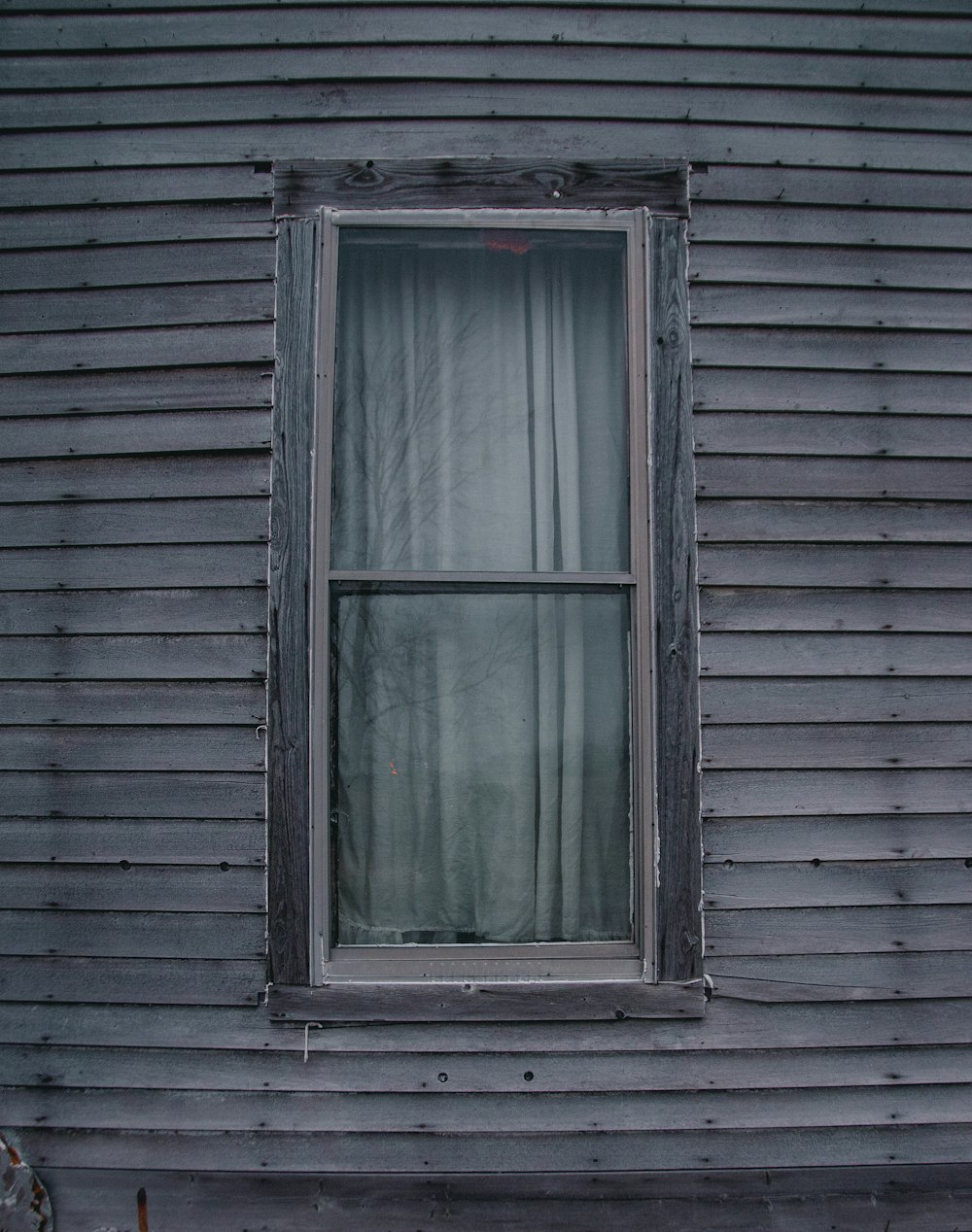 white wooden framed glass window