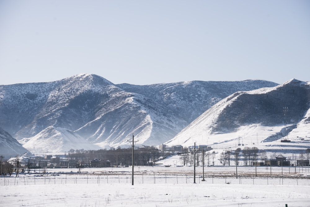 snow covered mountain during daytime