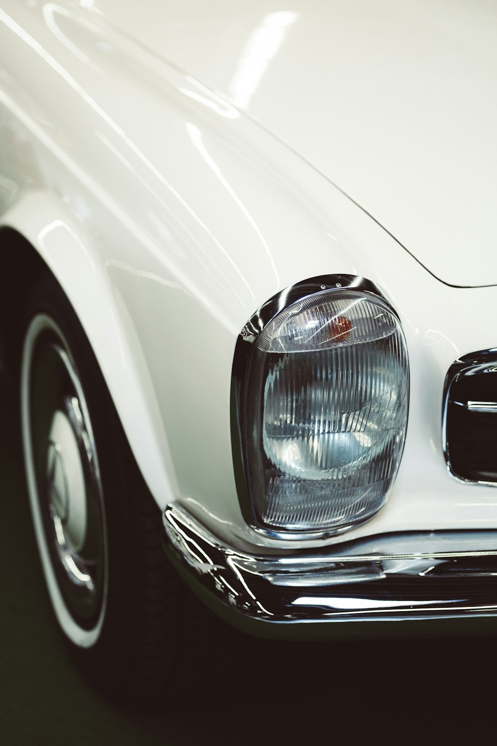 white car with blue light