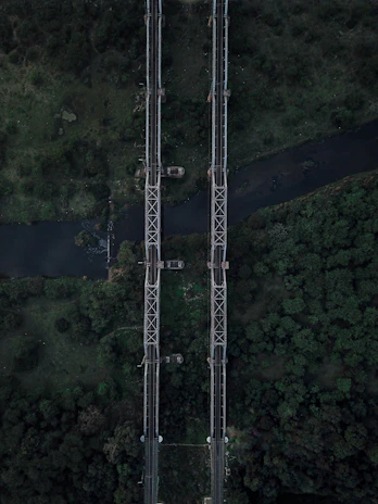 A panoramic view of a completed civil engineering project blending into the natural landscape of Traiguén.