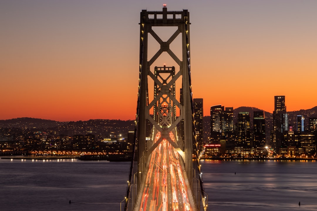 bridge over water during sunset