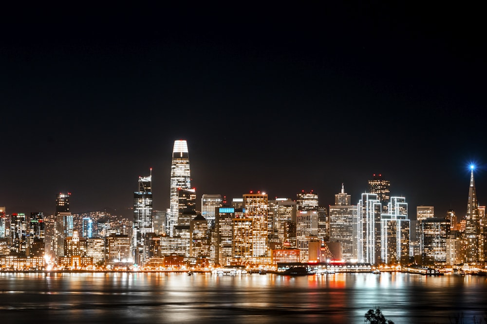 city skyline during night time