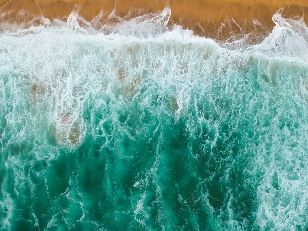 water waves on brown wooden table