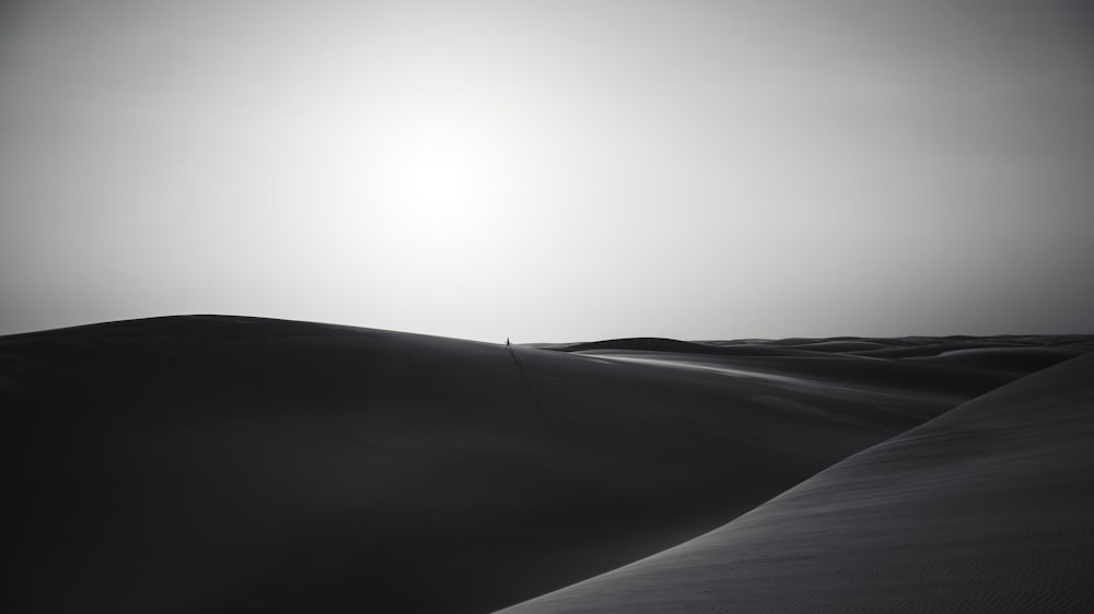 black car on desert during daytime