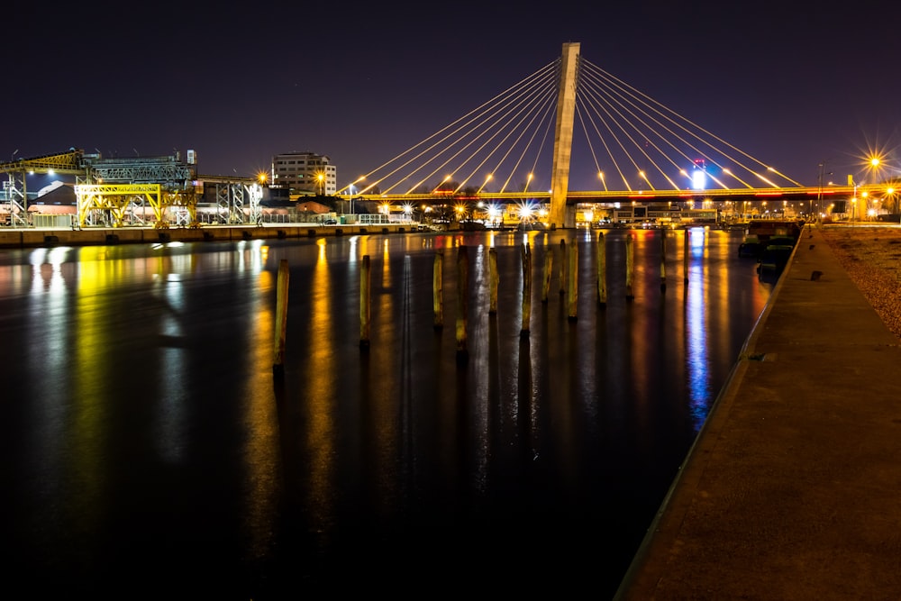 bridge over water during night time