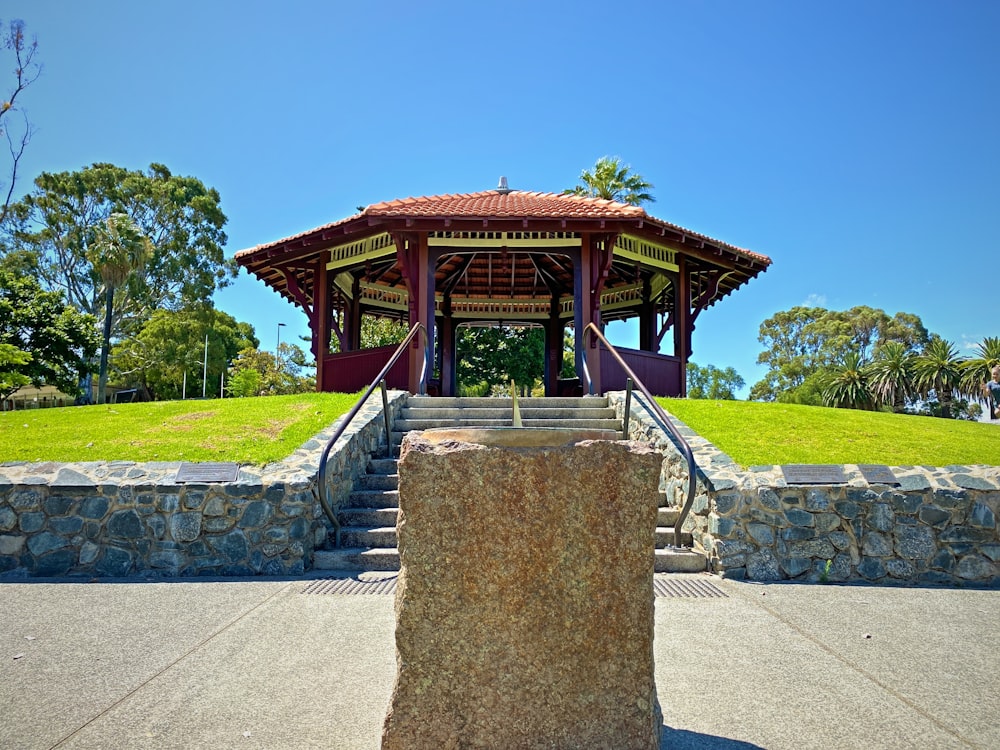 brown and red wooden gazebo