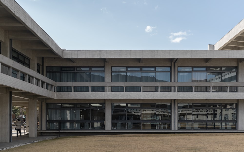 brown and white concrete building under blue sky during daytime