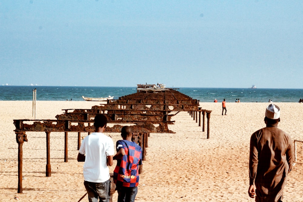 people walking on beach during daytime