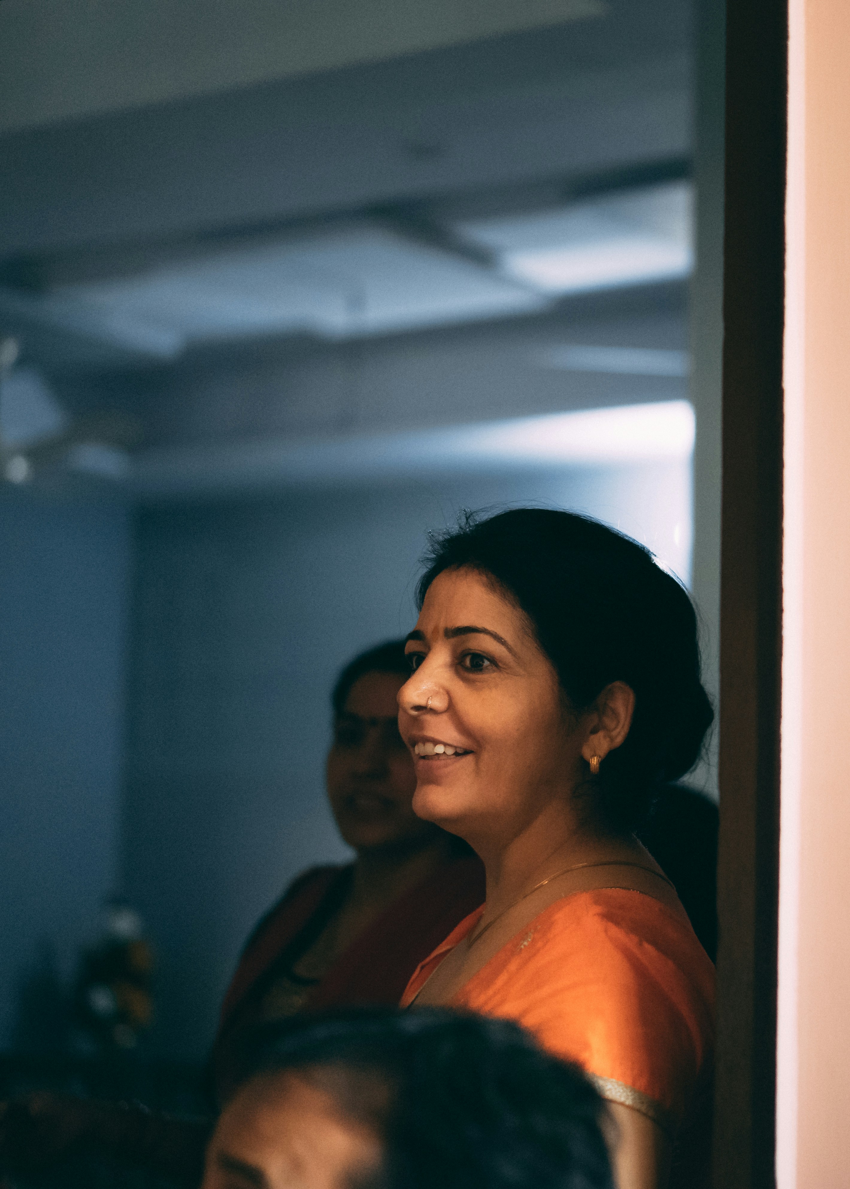 woman in black shirt smiling