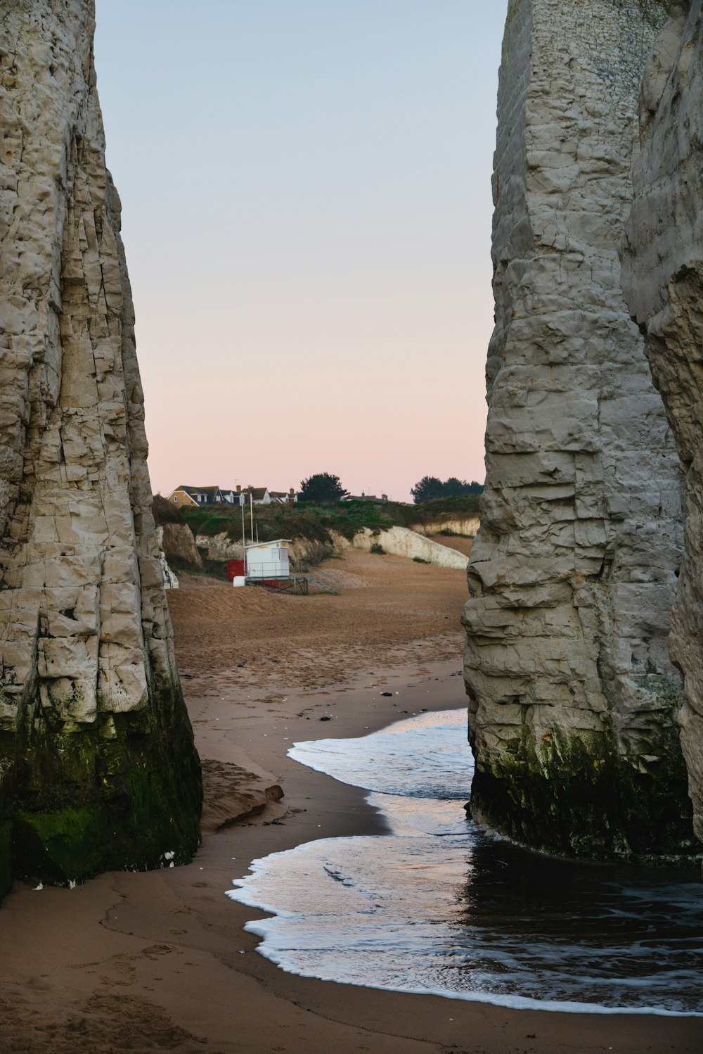 people walking on beach shore during daytime