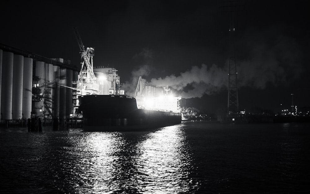 grayscale photo of ship on sea