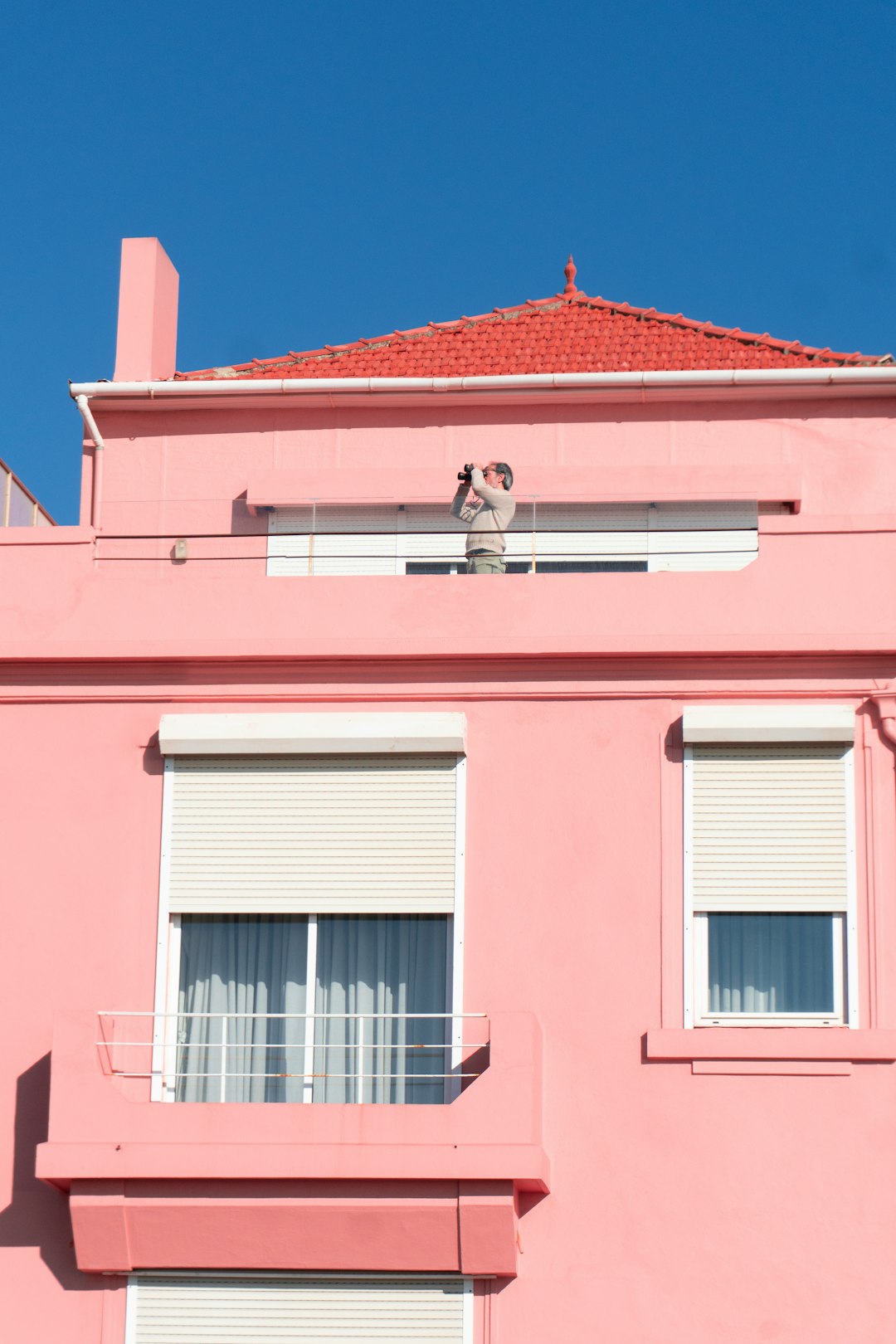 pink and white concrete building