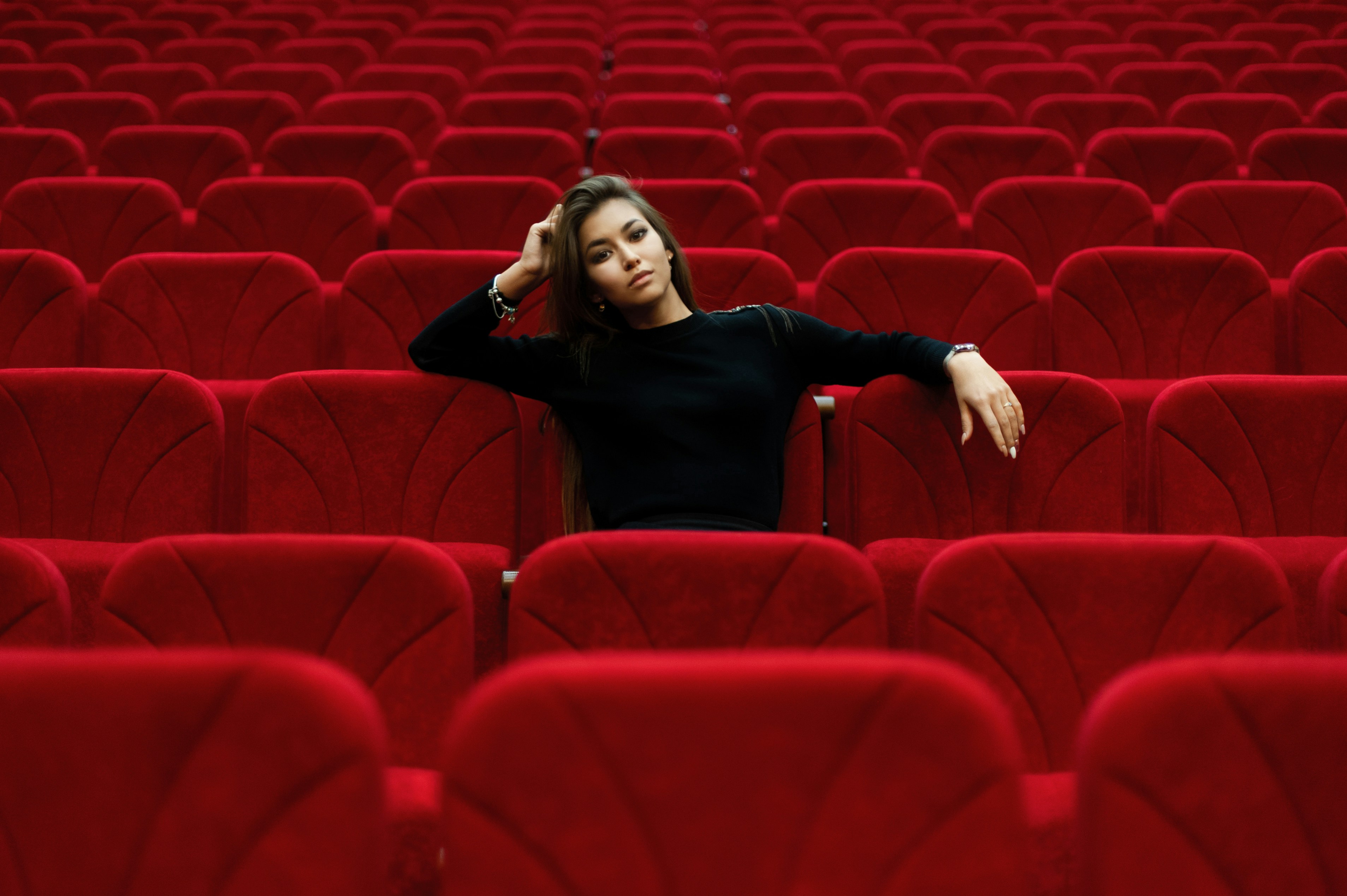 great photo recipe,how to photograph karina. ; woman in black long sleeve shirt sitting on red chair