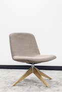 brown wooden framed gray padded chair