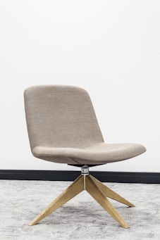 brown wooden framed gray padded chair