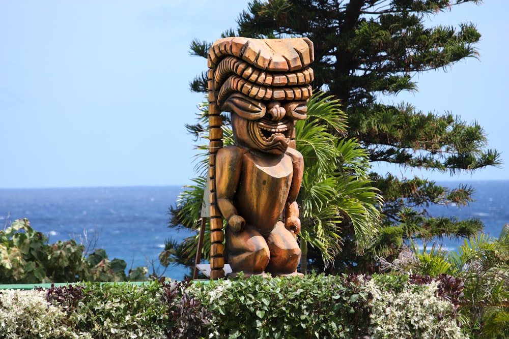 brown wooden human face carved decor