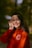 woman in red long sleeve shirt smiling